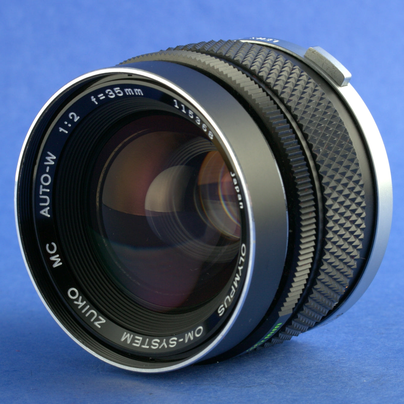 Olympus OM 35mm F2 Auto-W Zuiko Lens Near Mint Condition