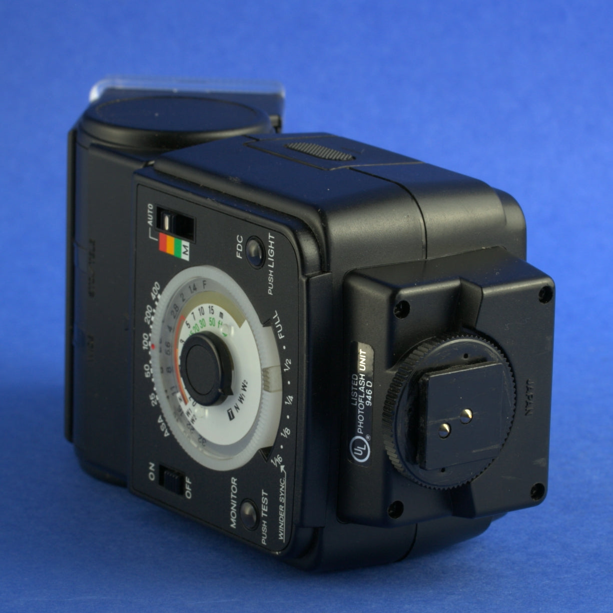 Minolta Auto 320X Flash with Remote Sensor Adapter and AC Adapter