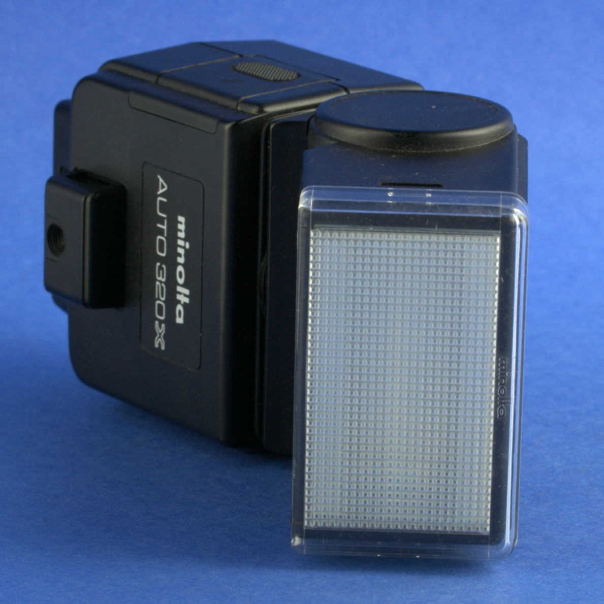 Minolta Auto 320X Flash with Remote Sensor Adapter and AC Adapter
