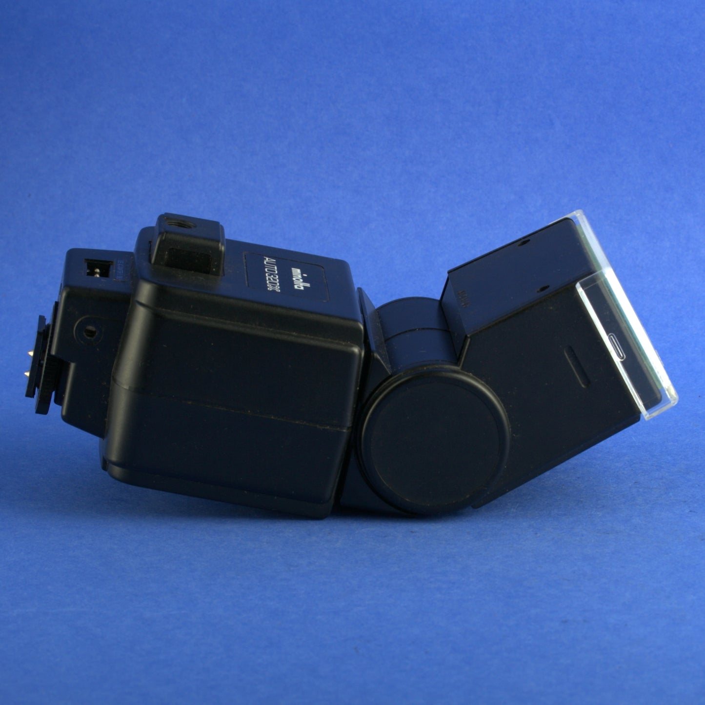 Minolta Auto 320X Flash with Remote Sensor Adapter and AC Adapter