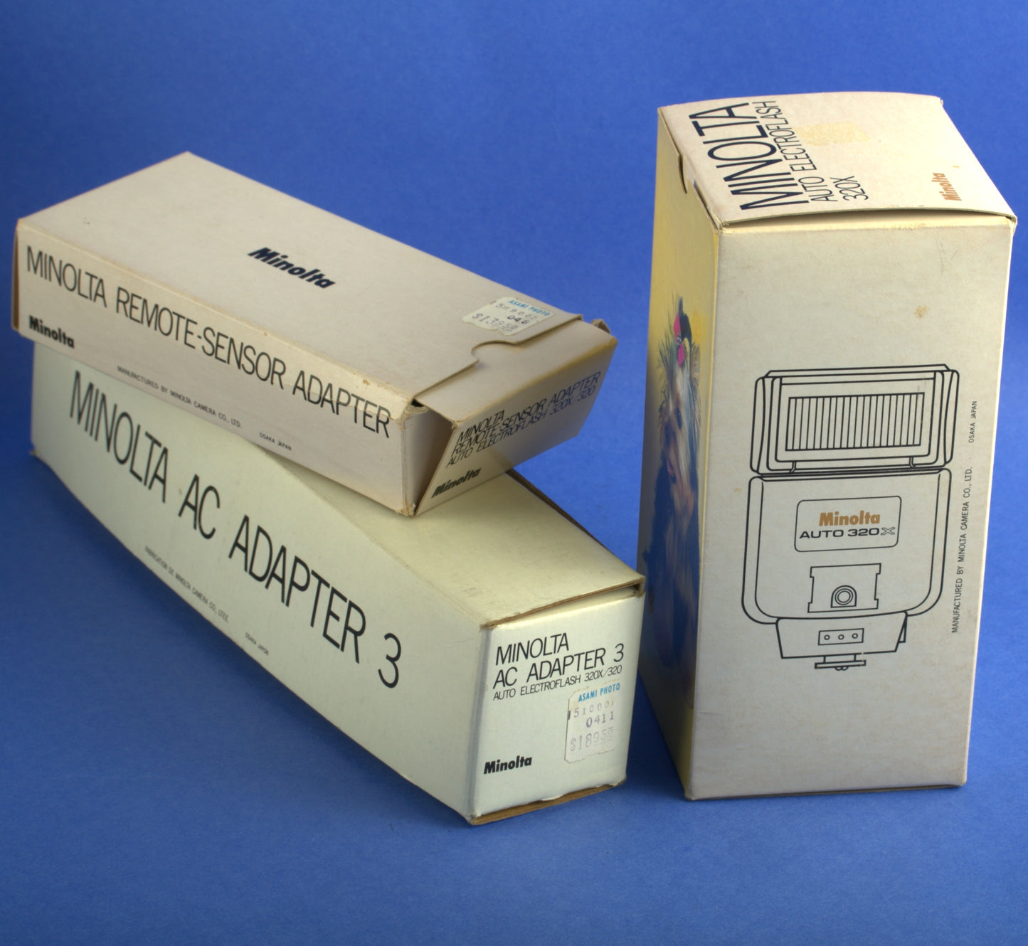 Minolta Auto 320X Flash with Remote Sensor Adapter and AC Adapter