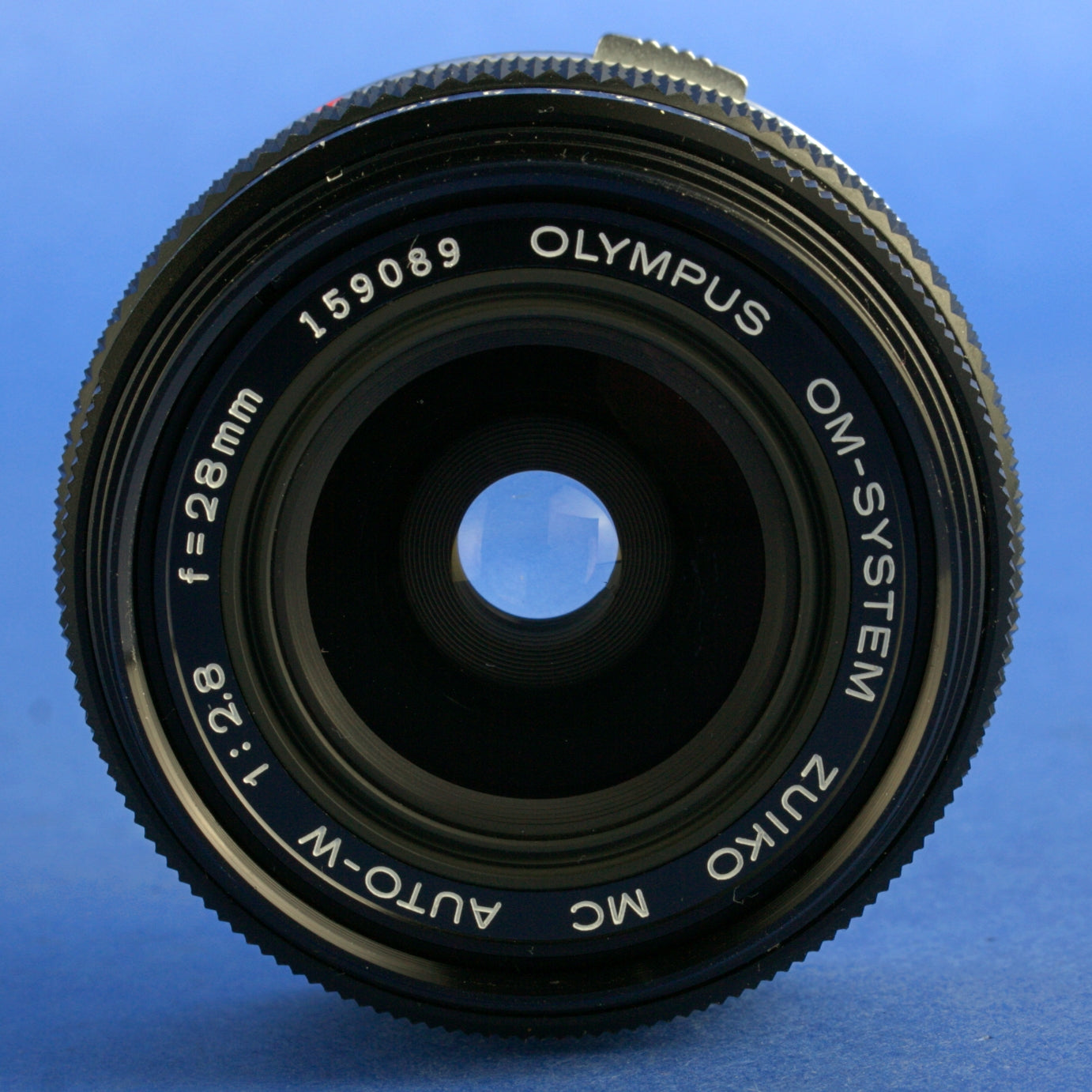 Olympus OM Zuiko 28m 2.8 Lens Near Mint Condition